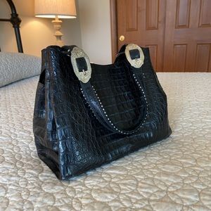 Nancy Gonzalez Black crocodile handbag.